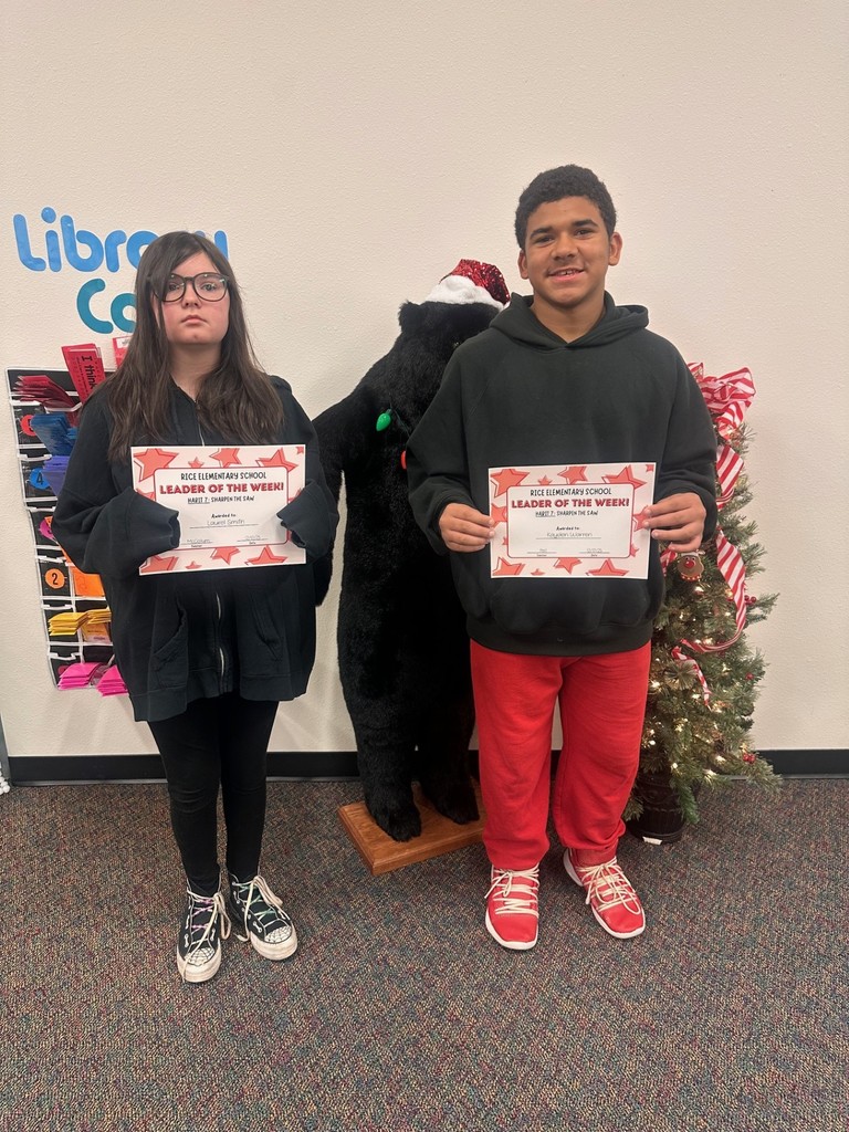 students holding certificates