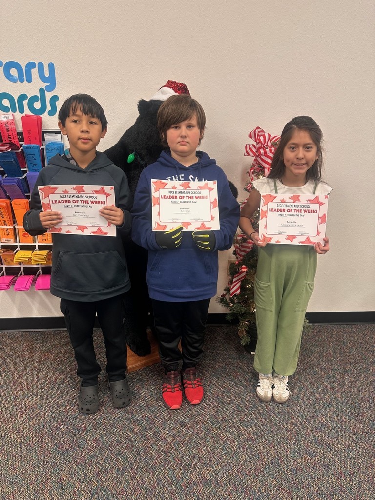 students holding certificates