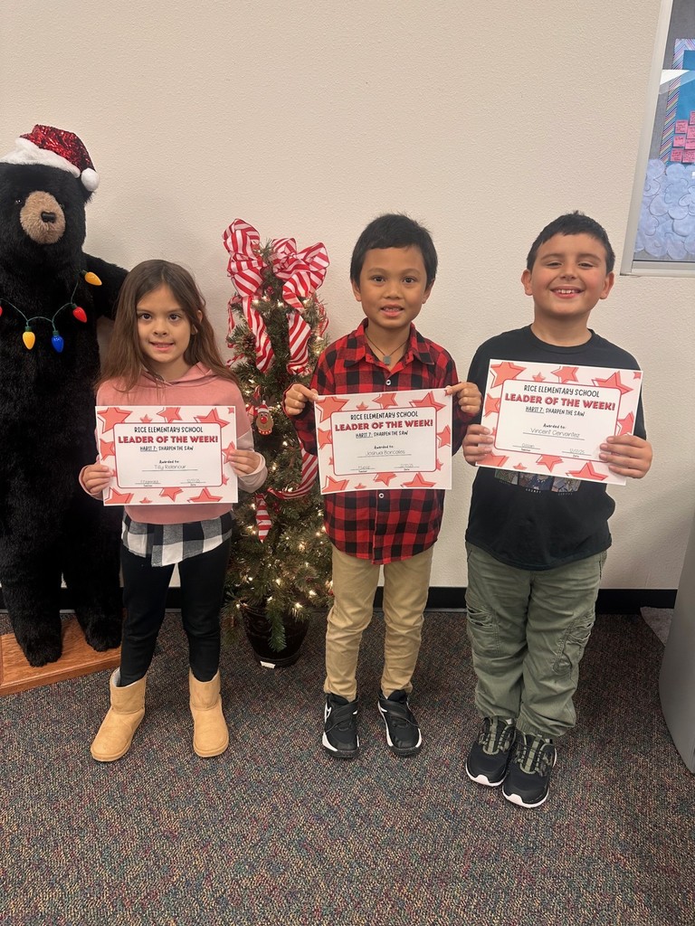 students holding certificates