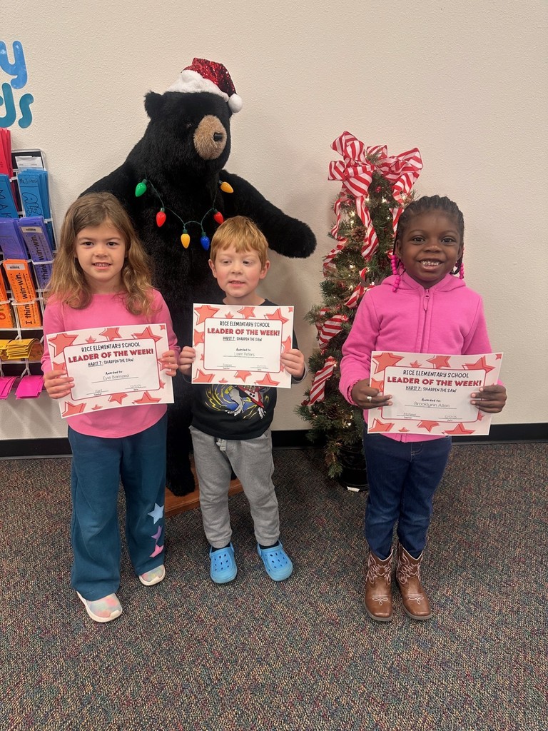 students holding certificates