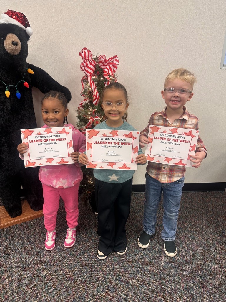 students holding certificates