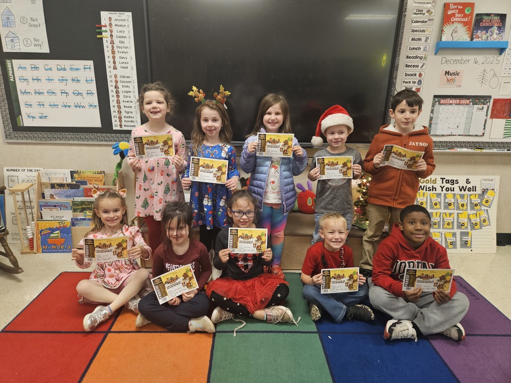 Students holding certificates.