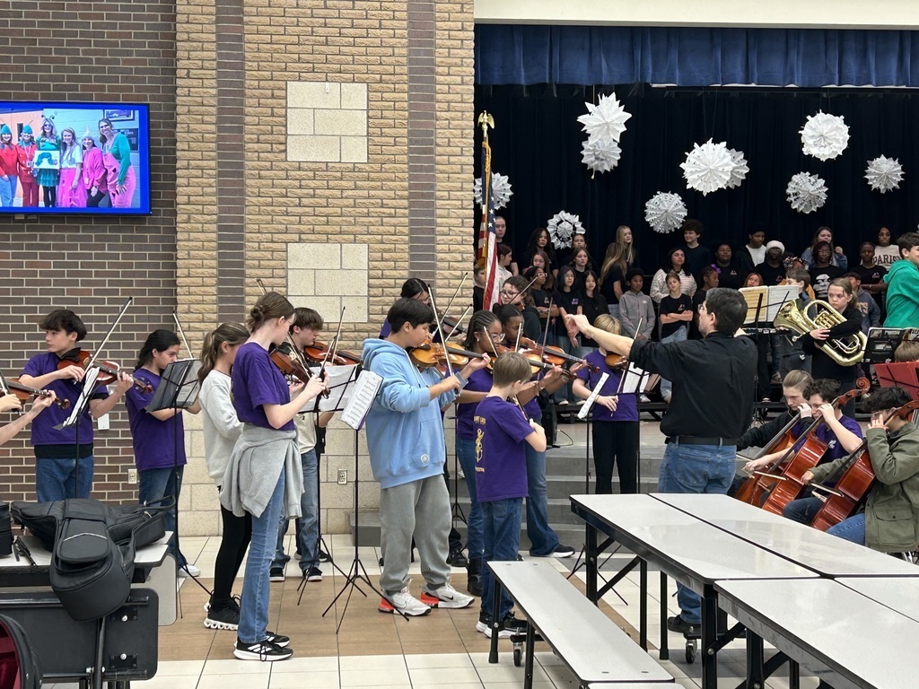 Students playing instruments for lunches.