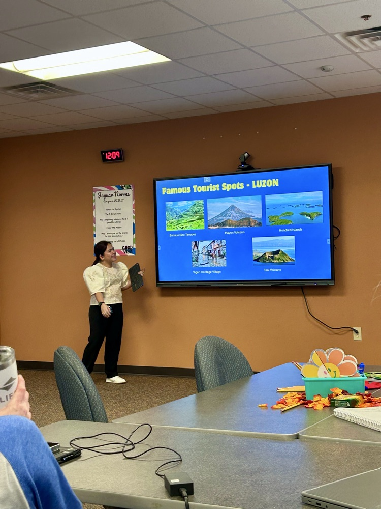 teacher presenting on the Philippines