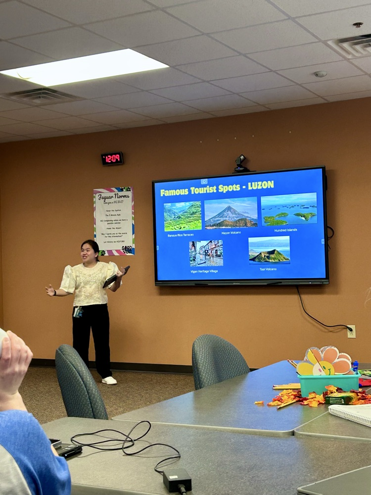 teacher presenting on the Philippines