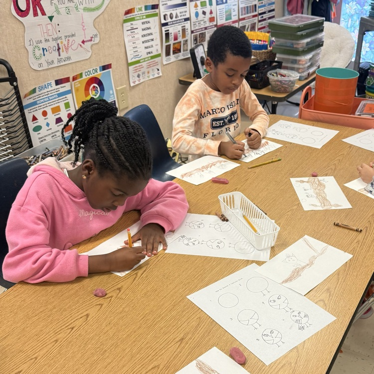 Students working on their artwork in class