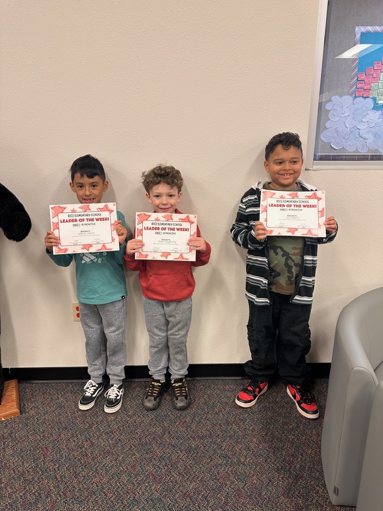 students holding certificates