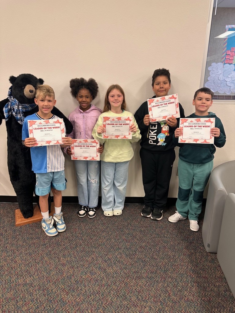 students holding certificates