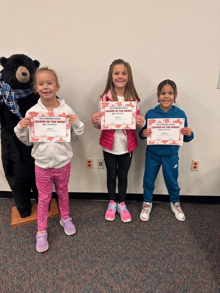 students holding certificates