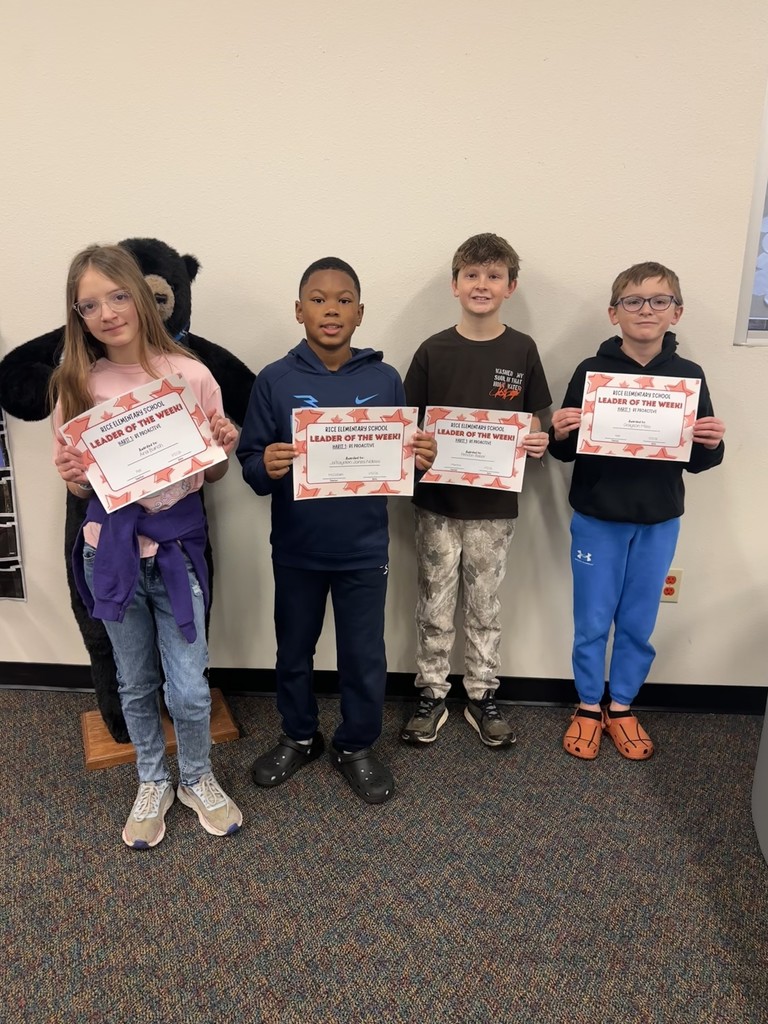 students holding certificates