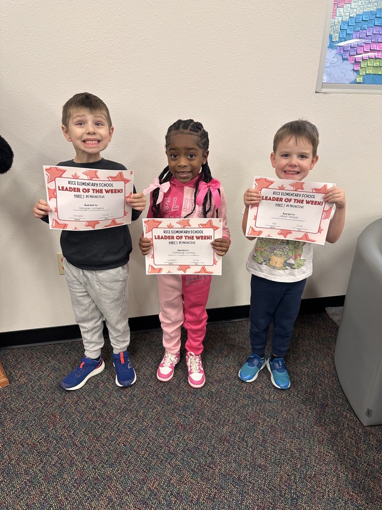 students holding certificates