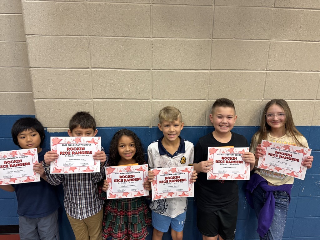 Students holding  certificates for i-ready