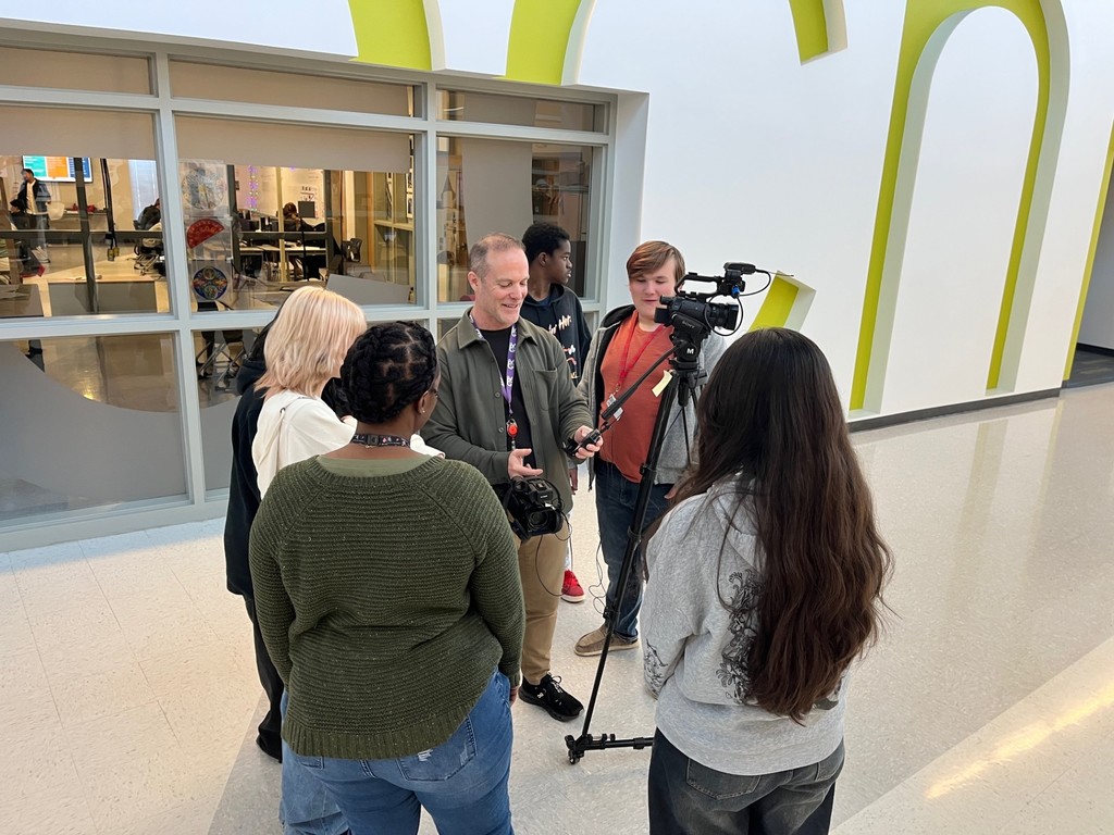 Teacher explaining microphone usage to audio video students at the CTC in Tyler ISD.