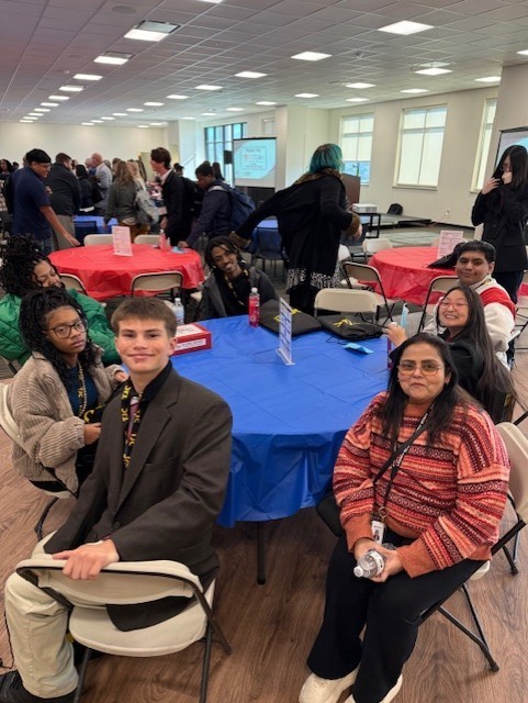Tyler Legacy Lifeskills students sitting at table for the C4 event