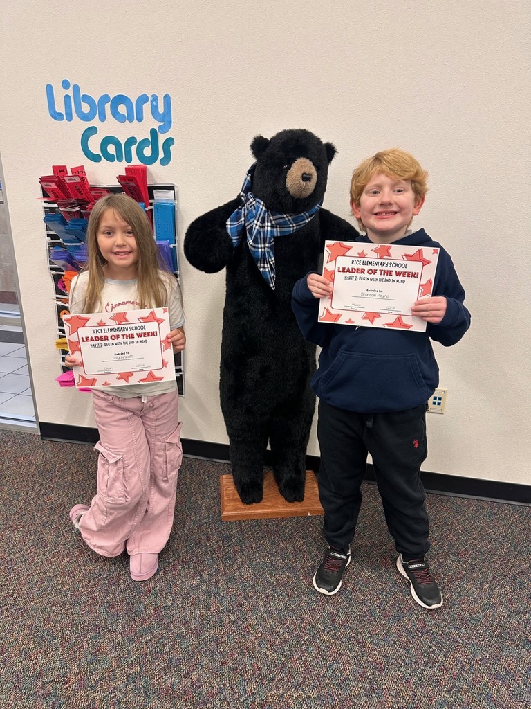 students holding certificates
