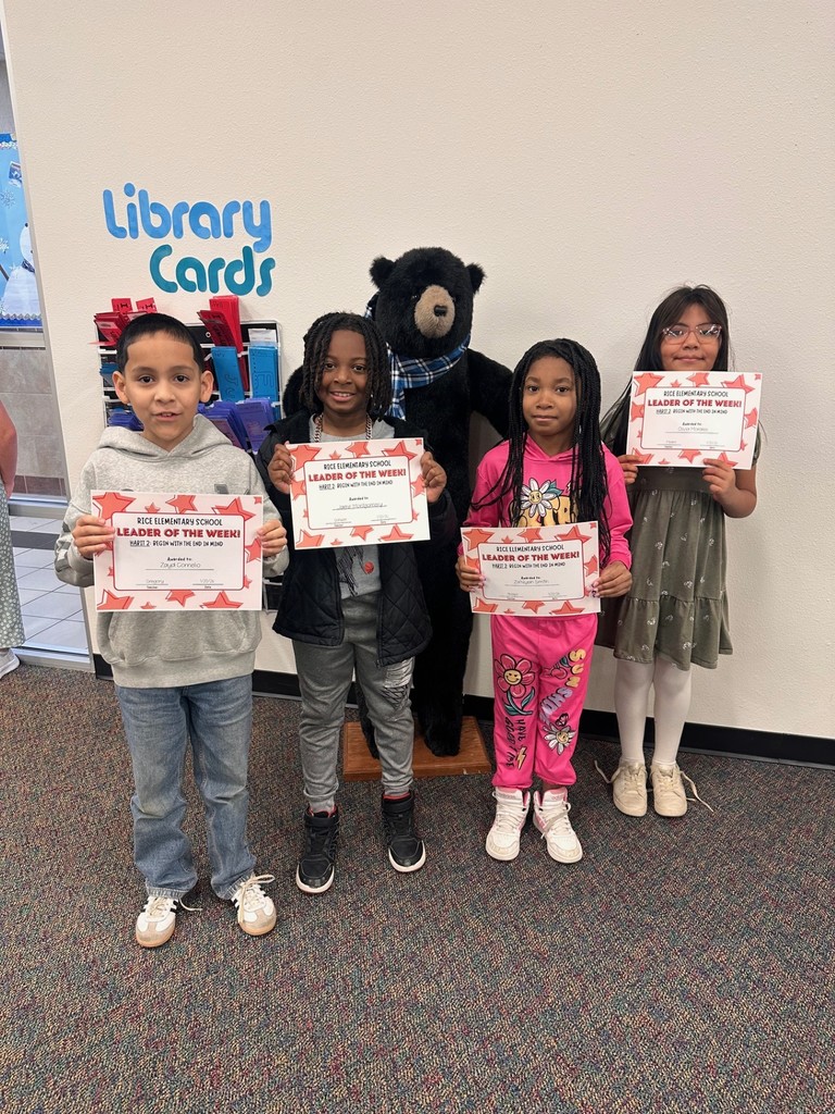 students holding certificates