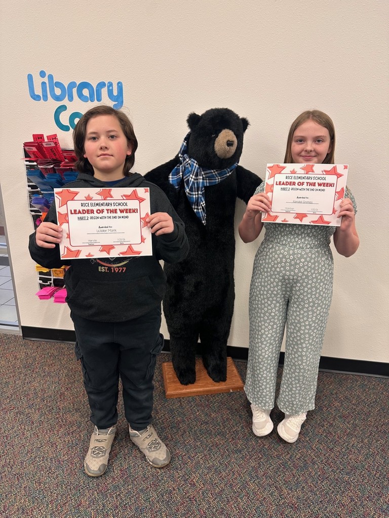 students holding certificates