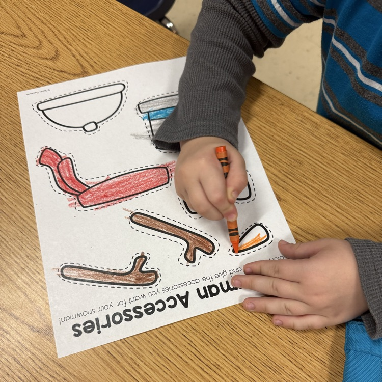 students making their own snowman cutout