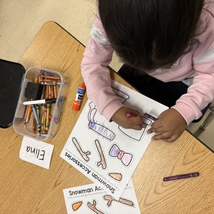 students making their own snowman cutout