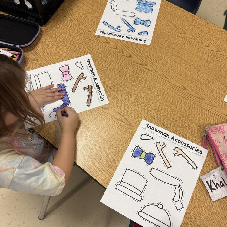 students making their own snowman cutout