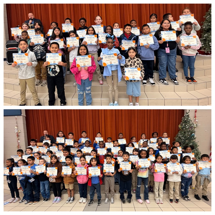 wards assembly photo of students with various awards