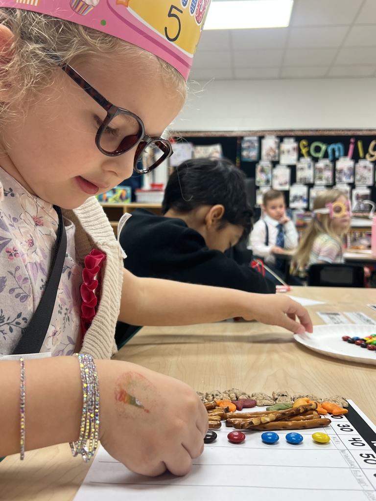 Student students practicing counting by tens to 100 and creating a snack