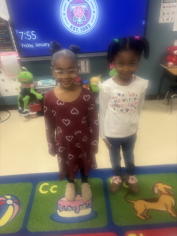 students smiling and posing 