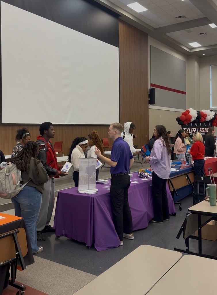 Tyler Legacy students talking to a college representative at the DARN college fair