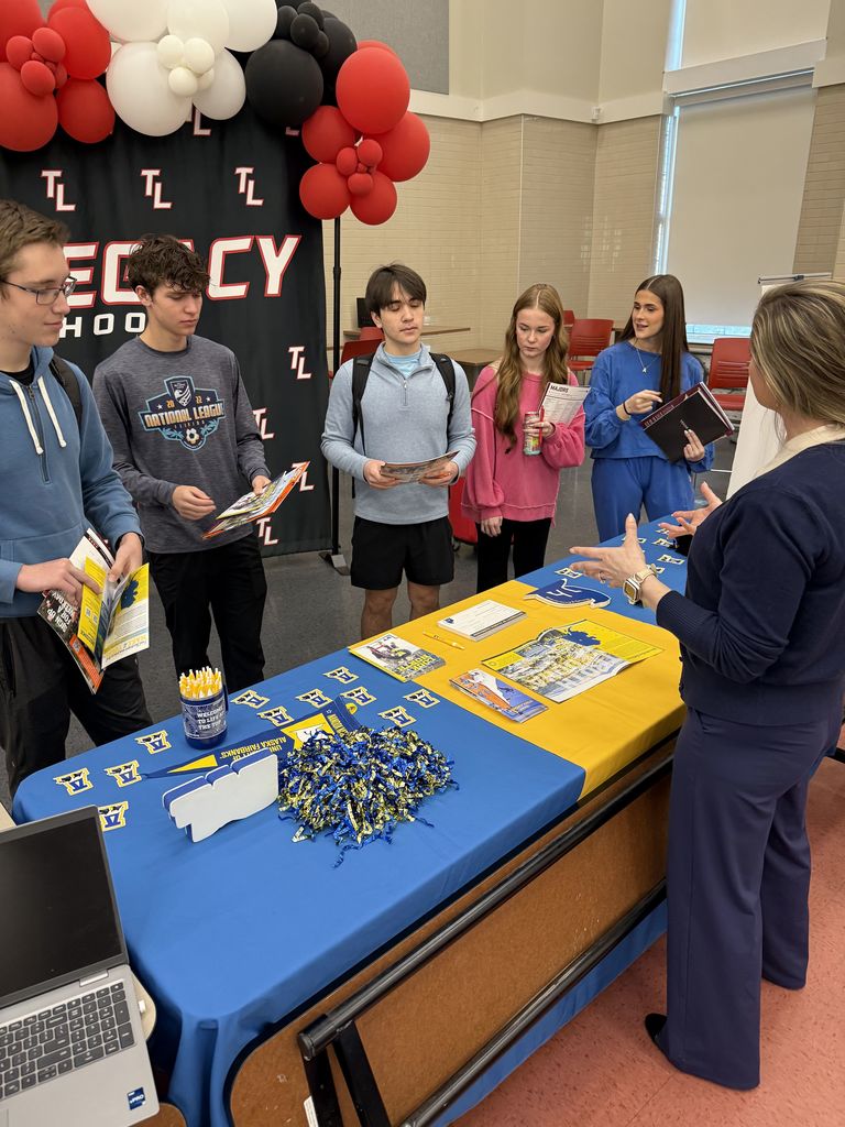 Tyler Legacy students talking to a college representative at the DARN college fair