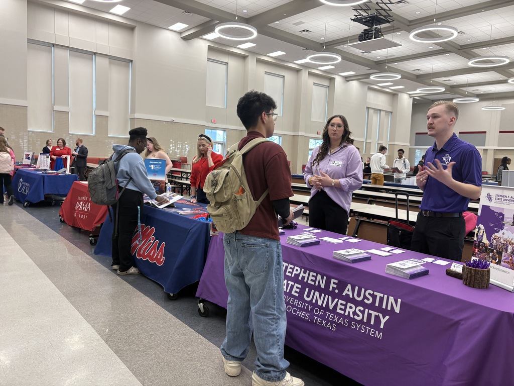 Tyler Legacy students talking to a college representative at the DARN college fair