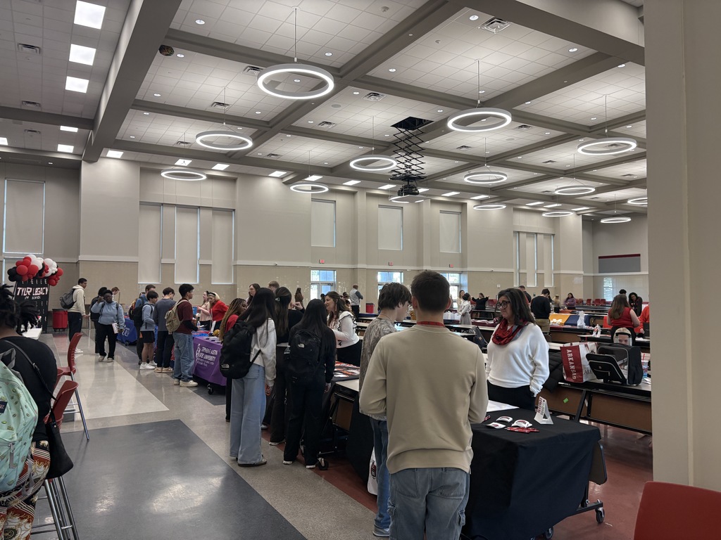 Tyler Legacy students talking to a college representative at the DARN college fair
