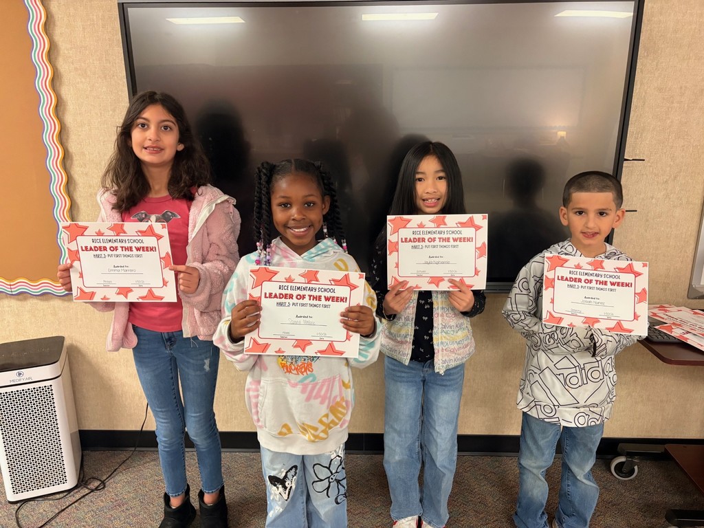 students holding certificates