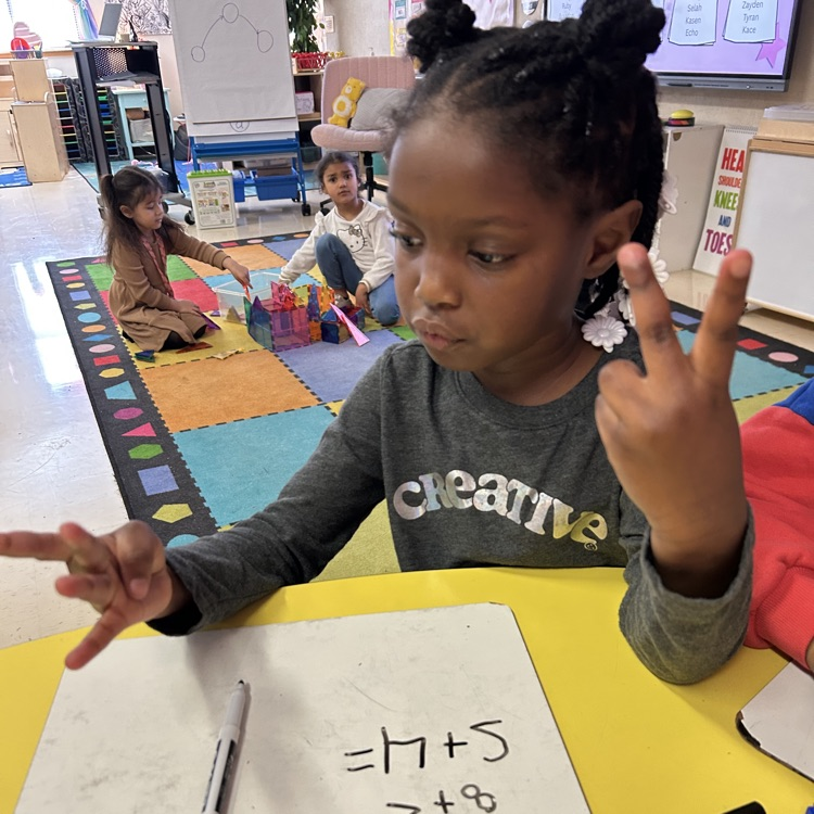 students working in a math small group