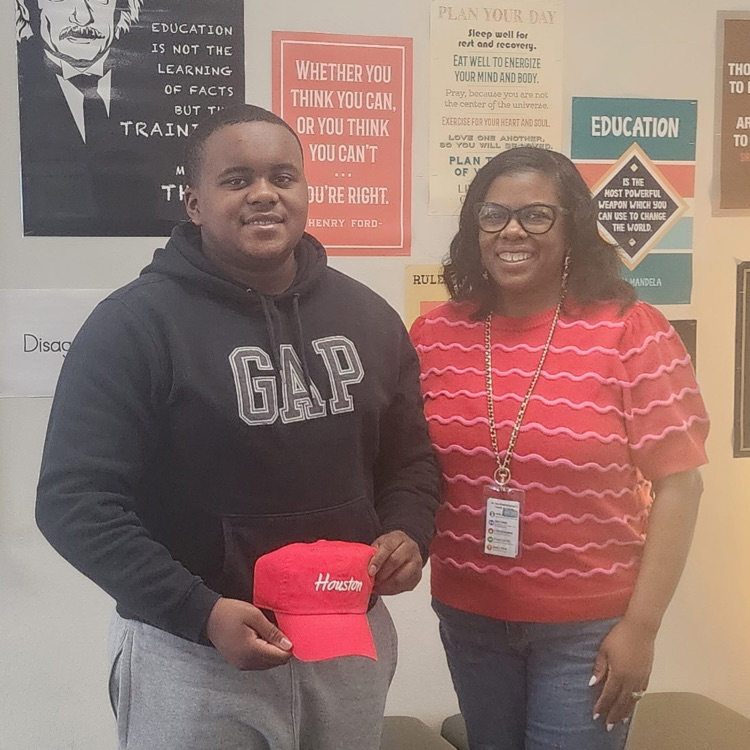 boy and lady holding hat