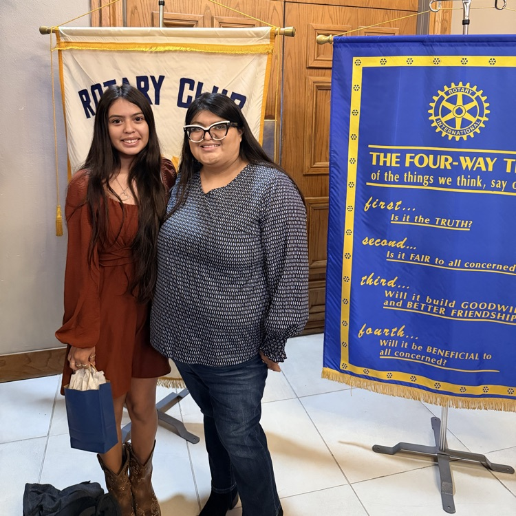 tow people posing for pictures