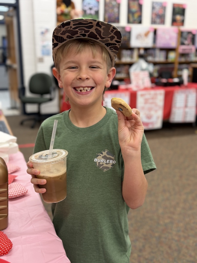 Student and his treat for book fair soft open.