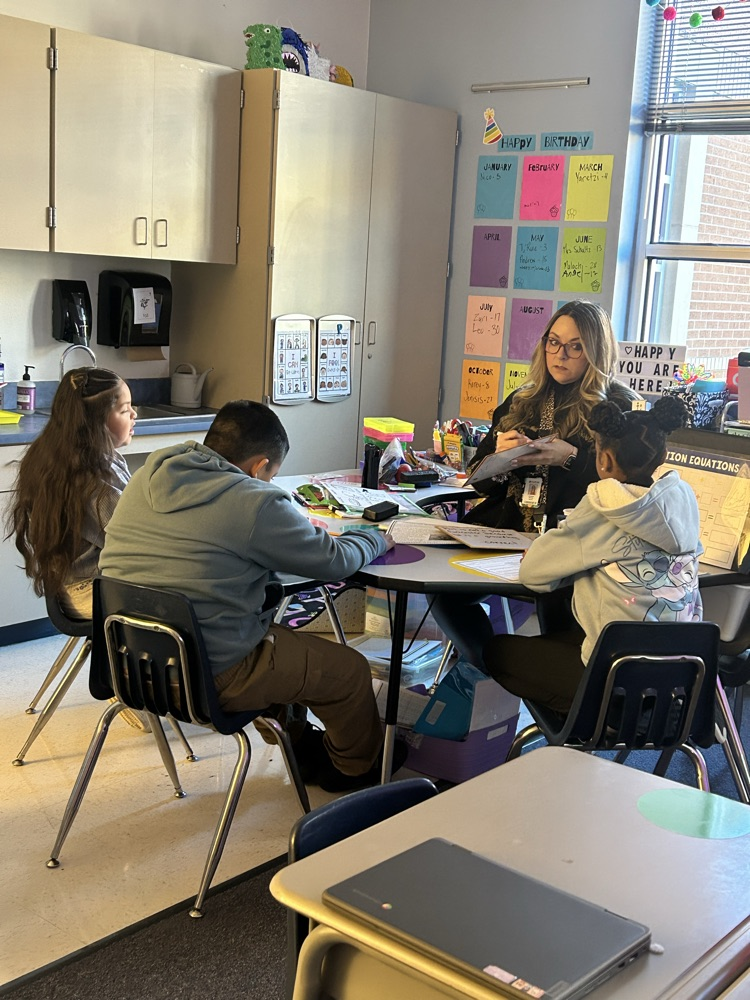 Students and Teachers Working Hard