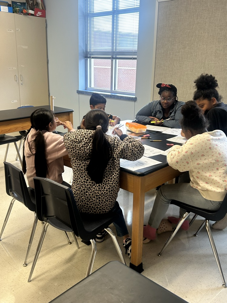 Students and Teachers Working Hard