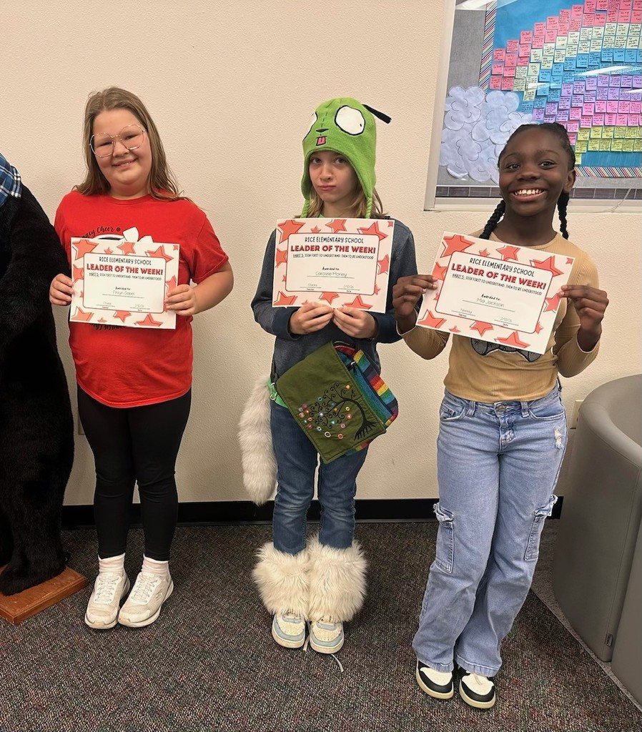 students holding certificates