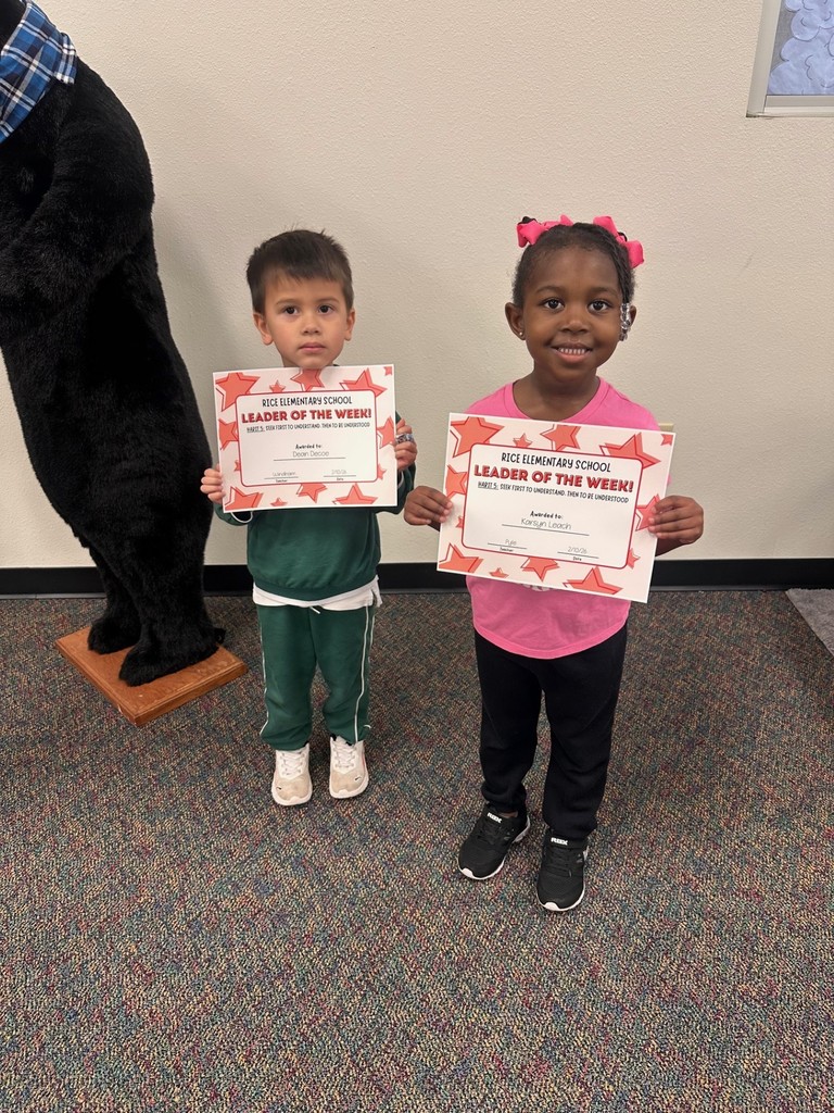 students holding certificates
