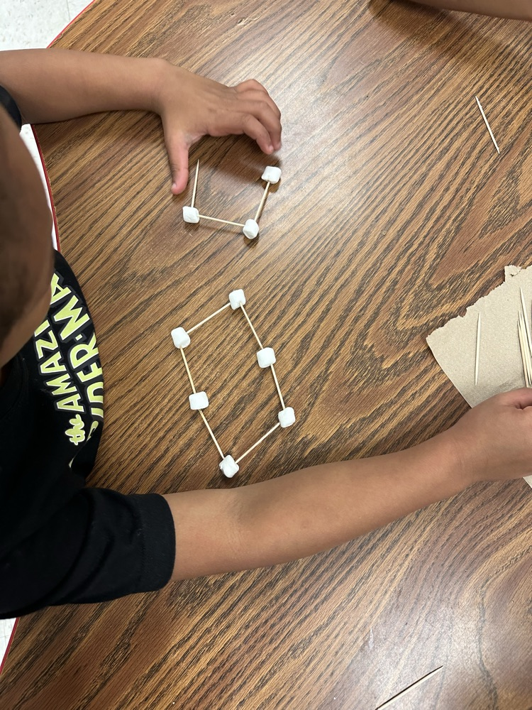 students working with shapes