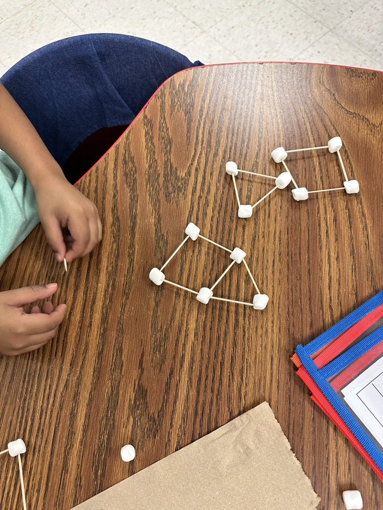 students working with shapes