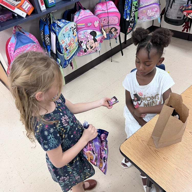 Student is working on valentine’s ride at tables