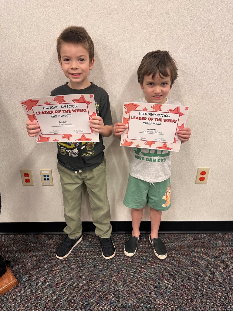 students holding certificates