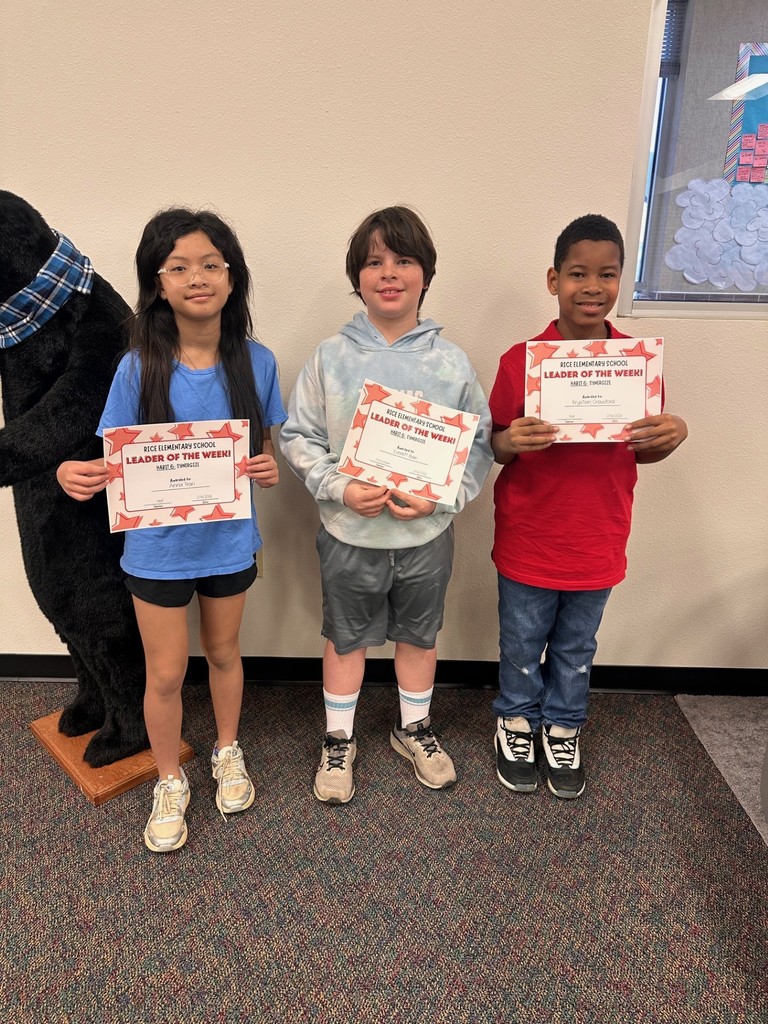 students holding certificates