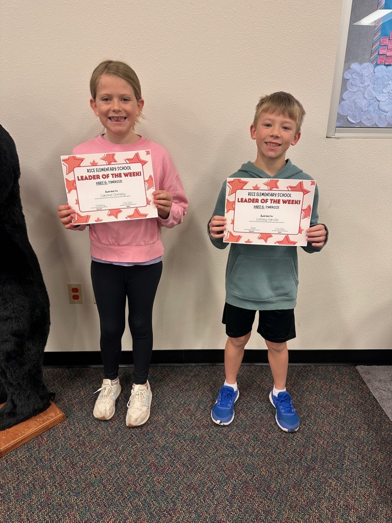 students holding certificates