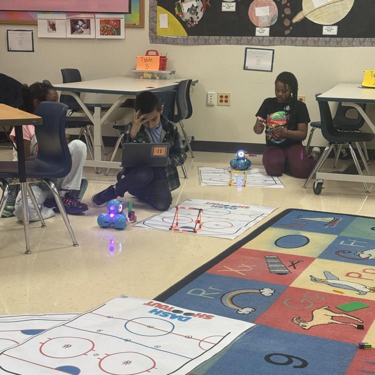 students building hockey sticks