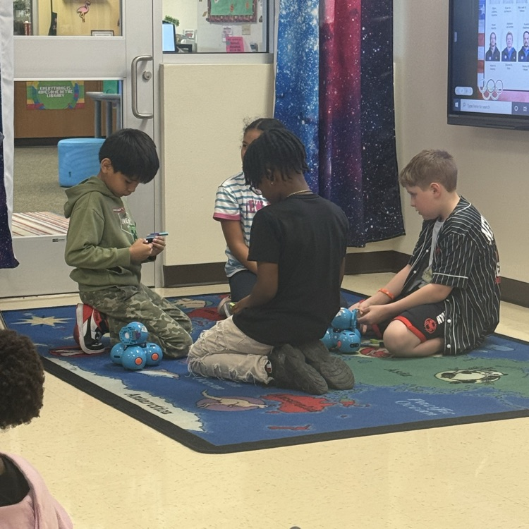 students building hockey sticks