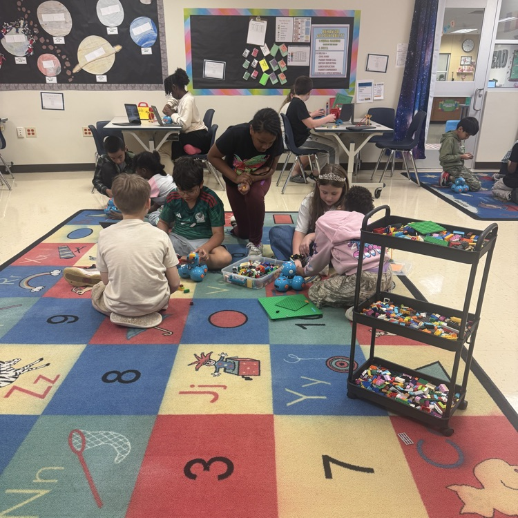 students building hockey sticks