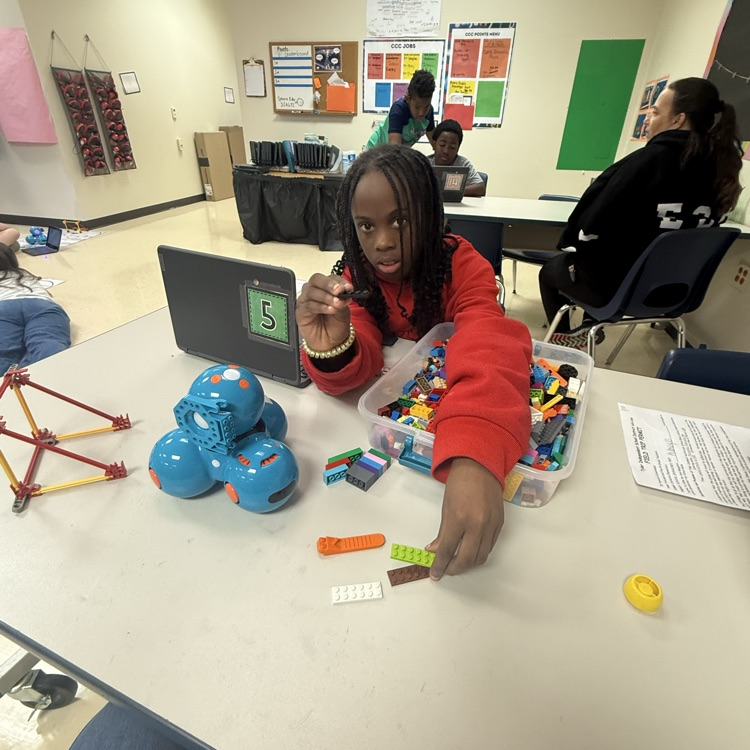 student building a hockey stick